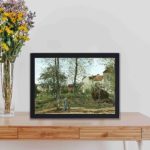 beauty of autumn with Camille Pissarro's "Landscape at Louveciennes" art print,displayed on a table