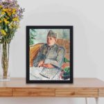 Vintage art print of Jacques-Emile Blanche's "Portrait de Francis Poulenc.",kept on a table