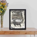 Our vintage art print featuring "Sheep in a Landscape with Two Trees" by Richard Roland Holst,kept on a table with black frame