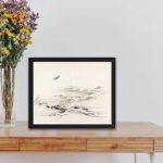 Experience the tranquility of nature with this vintage landscape art print by Kono Bairei. kept on a table