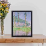 This product is a high-quality copy of a famous painting by Claude Monet,kept on a table