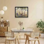 This vintage Pissarro "Apple Harvest" print,hung on a yellow background wall with black frame.