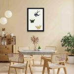 this stunning vintage art print featuring a swallow and butterflies from Yatsuo no Tsubaki by Taguchi Tomoki,displayed on the wall