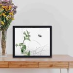 Enhance your decor with this stunning vintage art print of fireflies by Morimoto Toko,displayed on the table