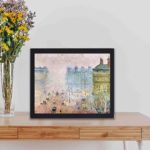 Experience the beauty of Paris with our "Place du Theatre Francais",displayed on a table with black frame