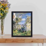 Experience the beauty of harvest season with this vintage art print of "Apple Harvest" by Camille Pissarro,displayed on a table