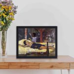 vintage art print of Paul Gauguin's "The Birth of Christ."displayed on a table