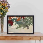 Discover the beauty of autumn with this Kamisaka Sekka maple leaf art print,kept on a table