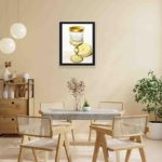 Featuring a stunning golden cup,hung on a yellow background wall with black frame