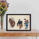 Experience the grace of Japanese dance with this Kamisaka Sekka "Dancers" vintage art print,displayed on a table