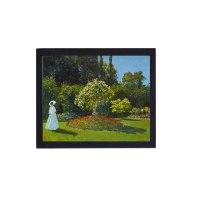 Monet's "Lady in the Garden". This vintage art print is a stunning reproduction,framed and placed on the wall