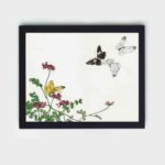 This stunning vintage art print of butterflies and a flower by Morimoto Toko,framed and placed on the wall