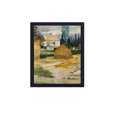 Vintage art print of Paul Gauguin's "Landscape near Arles." framed and placed on the wall