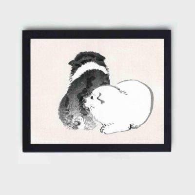 the playful charm of Black and White Puppies in this vintage art print by Kono Bairei,Displayed on the wall