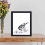 Discover the beauty of a Brown-eared Bulbul in this vintage art print by Numata Kashu,placed on the wall