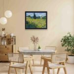 Enchanting beauty of Van Gogh's "Green Wheat Field with Cypress" with this vintage art print,mounted on the wall