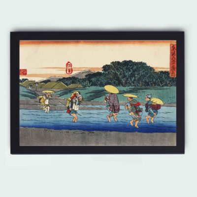 Vintage Fujieda Art Print by Hiroshige. Immerse in Japanese beauty with travelers crossing a stream. hung on a grey background wall