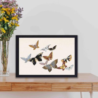 Experience the beauty of Japanese art with this Kamisaka Sekka butterfly print,displayed on a table