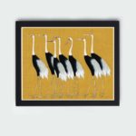 vintage art print of a traditional Japanese red-crowned crane flock by Ogata Korin, framed and placed on the wall