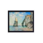 Vintage art print of Claude Monet's "The Cliffs at Étretat" (1885),mounted on the wall