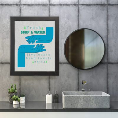 Infidu Fresh Soap & Water Wall Art with light grey background, blue hand illustrations, green and blue text, and a black frame. hung on the wall in the bathroom a black frame