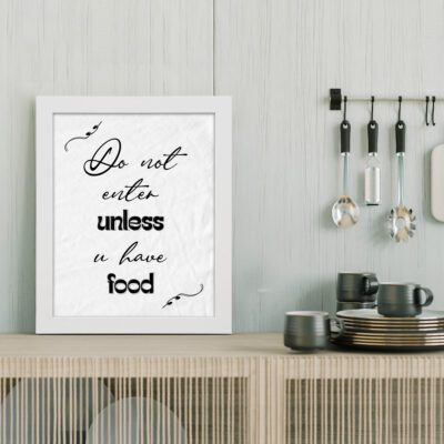 Do Not Enter Unless U Have Food Kitchen Wall Art with black cursive and bold fonts on a white background with decorative flourishes.displayed on the table in a black frame