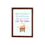 Baby in a crib with pastel balloons and Jeremiah 1:5 Bible verse, Before I Formed You in the Womb. Wall art for kids' room decor. hung on the wall in a brown frame