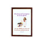 Be Strong and Courageous Joshua 1:9 Bible verse wall art featuring Jesus and two children with a soft blue background. hung on the wall in a brown frame