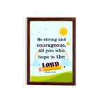 Be Strong And Courageous Psalm 31:24 Bible Verse Wall Art with sun and stars on a sky blue background for kids. hung on the wall in a brown frame