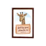 Jeremiah 29:11 Bible verse wall art featuring a cheerful giraffe on a sky-blue background, designed for children's rooms. hung on the wall in a brown frame