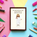 Jesus holding a staff with the verse For the Lord your God will be with you on cream background wall art for kids. displayed on the wall in a brown frame in a colorful background