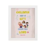 Christian wall art with happy children holding hands and Psalm 127:3 text 'Children are a gift from the Lord. hung on the wall in a white frame