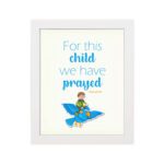 For This Child, We Have Prayed 1 Samuel 1:27 Bible Verse Wall Art with a child on blue bird illustration hung on the wall in a white frame