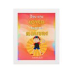 Colorful wall art featuring a happy child holding a heart with the quote You Are Loved Beyond Measure and Romans 8:38. hung on the wall in a white frame