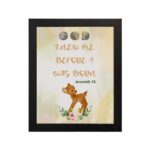 Artwork of a baby deer with flowers and the verse God knew me before I was born in warm colors. Perfect for children's decor. hung on the wall in a black frame