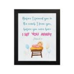 Baby in a crib with pastel balloons and Jeremiah 1:5 Bible verse, Before I Formed You in the Womb. Wall art for kids' room decor. hung on the wall in a black frame