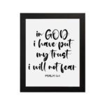 Christian wall art with Psalm 56:4 text on a white background. hung on the wall in a black frame