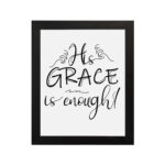 His Grace Is Enough Christian wall art in black cursive font on a white background emphasizing the word 'GRACE'. hung on the wall in a black frame