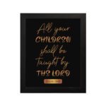 Infidu Christian Wall Art with Isaiah 54:13 in gold script on black background - All Your Children Shall Be Taught by The Lord. hung on the wall in a black frame