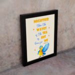 Wall art featuring a blue and yellow bird with the verse Mightier than the waves of the sea is His love for me from Psalm 93:4. displayed on the wall in a black frame