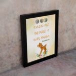 Artwork of a baby deer with flowers and the verse God knew me before I was born in warm colors. Perfect for children's decor. displayed on the wall in a black frame