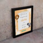 I Can Do All Things Through Christ Philippians 4:13 Bible Verse Wall Art featuring a lion and elephant for kids' room decor. displayed on the wall in a black frame