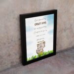 Raccoon with Bible verse God showed His great love for us by sending Christ to die for us while we were still sinners Romans 5:8 wall art for kids. displayed on the wall in a black frame