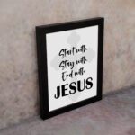 Start With Jesus, Stay With Jesus, End With Jesus Bible Wall Art displayed on the wall in a black frame Christian Home Decor