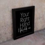 Christian wall art with the text Your Right Hand Upholds Me and PSALM 63:8 on a black background. displayed on the wall in a black frame