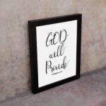 Infidu wall art with the text "GOD will provide" in black font on a white background, featuring the Bible verse Philippians 4:19. displayed on the wall in a black frame