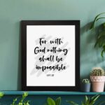 Luke 1:37 For With God Nothing Shall Be Impossible Bible Verse Christian Wall Art displayed on the table in a white frame