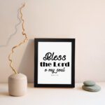 Infidu wall art featuring the text Bless the Lord O my soul inspired by Psalm 103:1, designed in white on a white background. displayed on the wall in a black frame