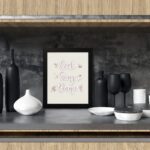 Cook Sing Dance kitchen wall art with pastel pink tones, a beige background, and musical notes.