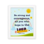 Be Strong And Courageous Psalm 31:24 Bible Verse Wall Art with sun and stars on a sky blue background for kids. hung on the wall in a white frame